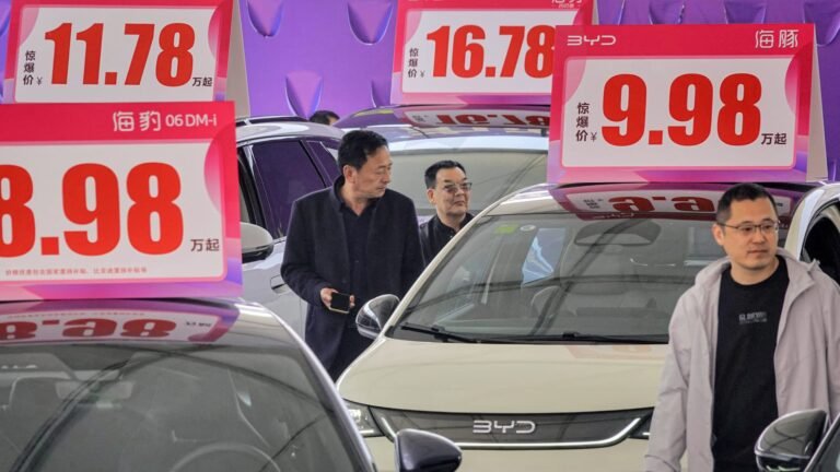 China’s EV price war is heating up. What’s behind the big discounts?